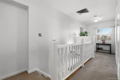 a view of hallway with livingroom