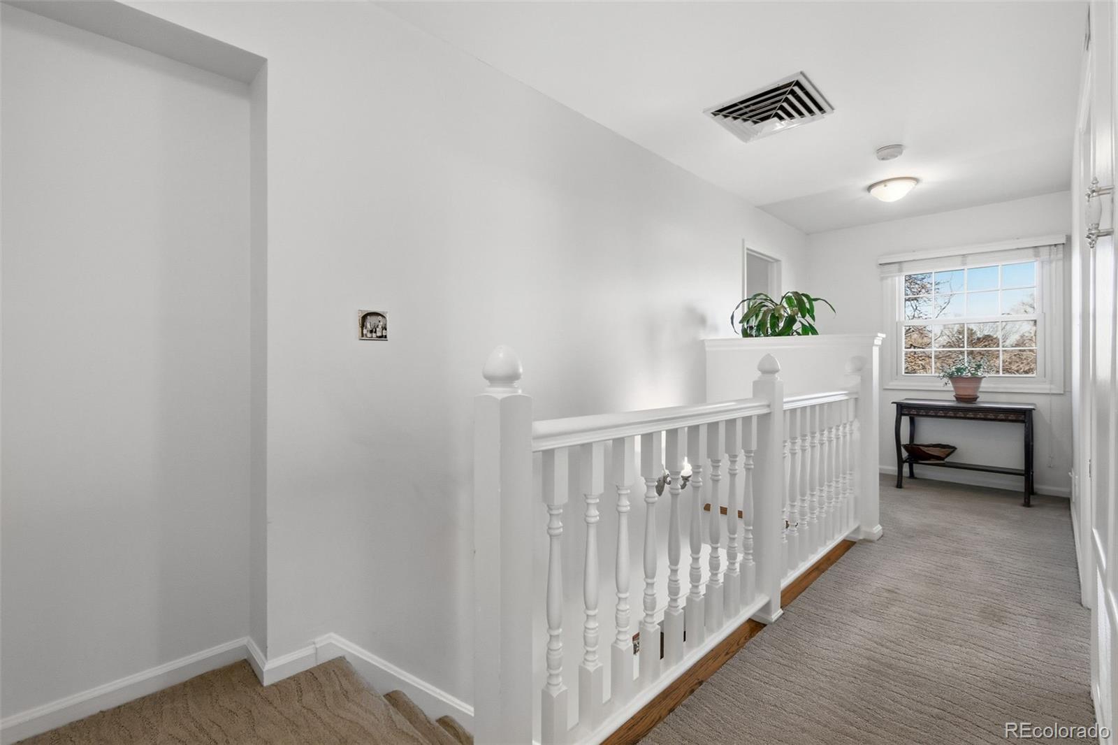 3561 South Oneida Way Denver, CO 80237 - Photo 18 of 48 a view of hallway with livingroom