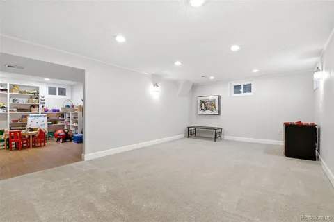 a view of an empty room with stairs