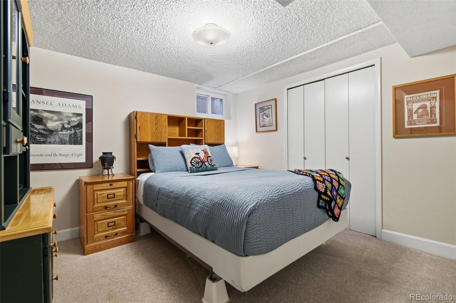 3561 South Oneida Way Denver, CO 80237 - Photo 30 of 48 a bed room with a bed and a tv