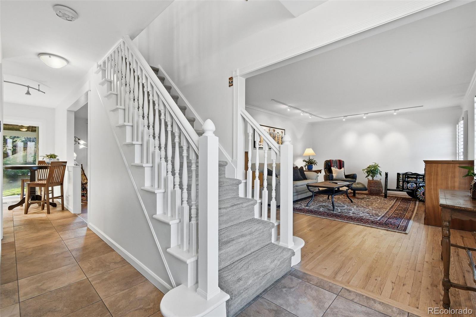 3561 South Oneida Way Denver, CO 80237 - Photo 3 of 48 a view of a livingroom with furniture and a livingroom