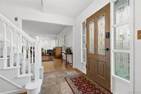 a view of a livingroom with furniture and a rug
