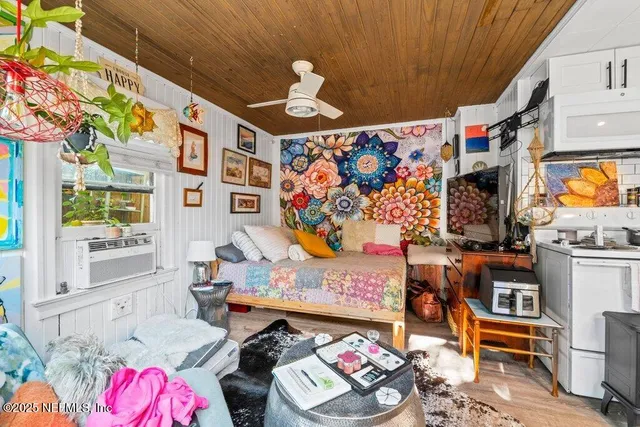 a kitchen with stainless steel appliances a stove refrigerator sink and cabinets