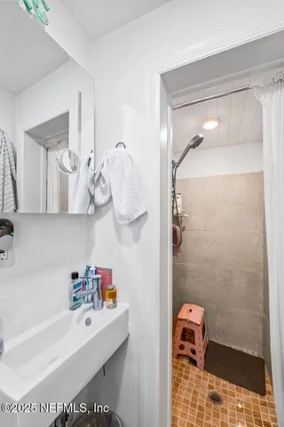 a backyard of a house with seating space