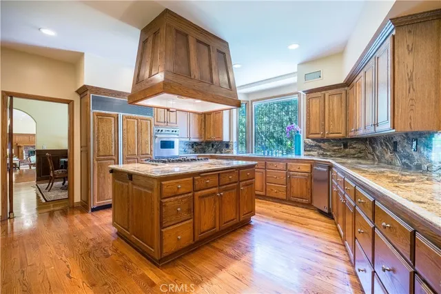 a living room with furniture fireplace and a flat screen tv