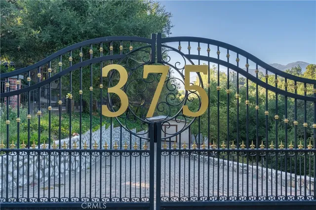 a front view of a building with a street