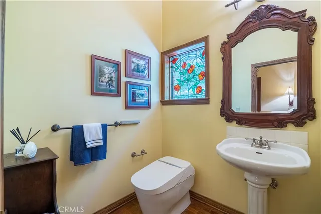 a white bath tub sitting next to a bathroom sink