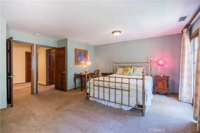 a view of a wooden deck with a yard