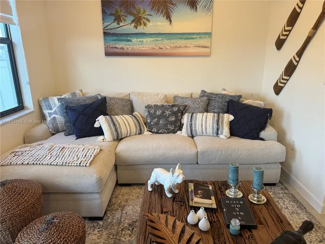 a kitchen with a stove and a white cabinets