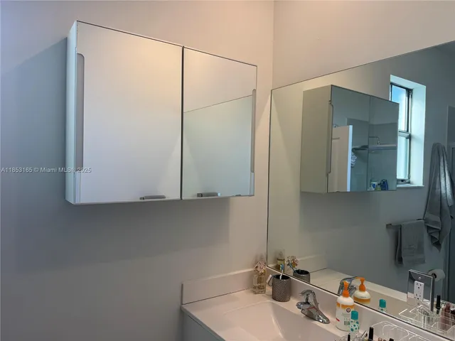 a bathroom with a sink and a toilet