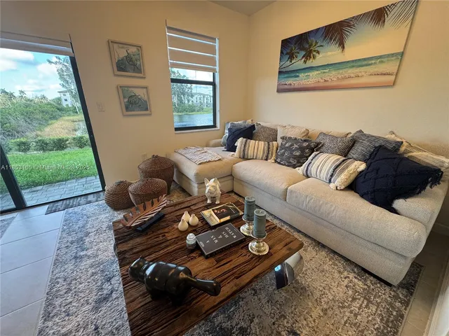 a bathroom with a toilet a sink and a mirror