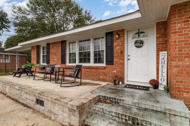 a view of a dinning room with a patio