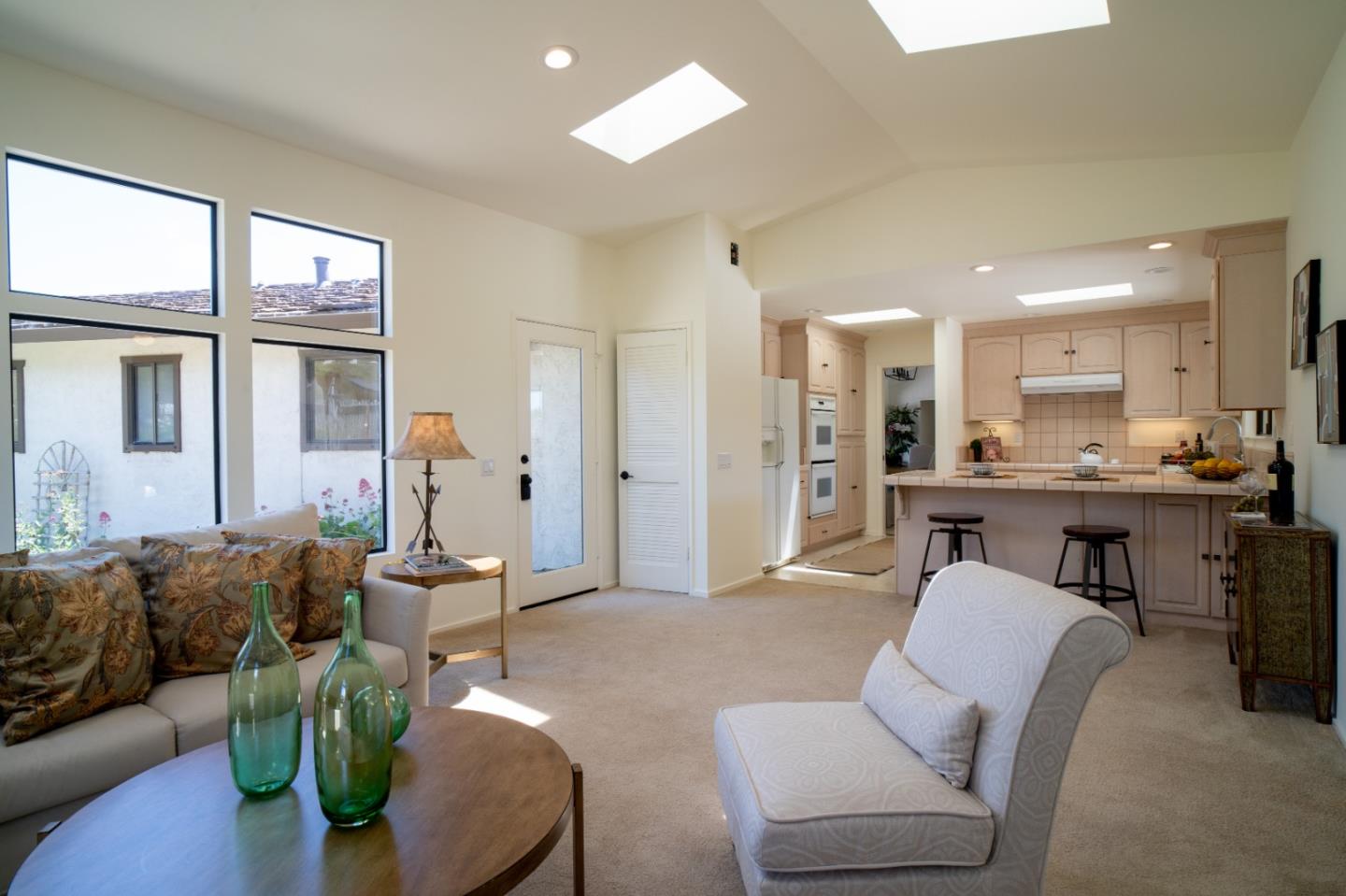 25815 Rio Vista Drive Carmel, CA 93923 - Photo 19 of 49 a living room with furniture and a large window
