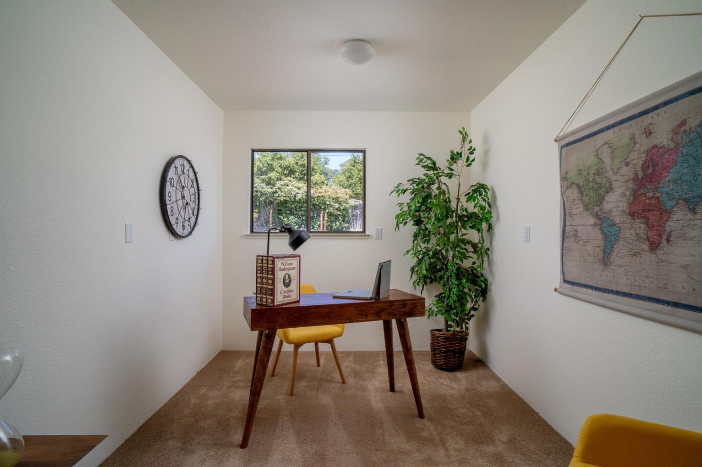 25815 Rio Vista Drive Carmel, CA 93923 - Photo 28 of 49 a view of a room with a table and a potted plant