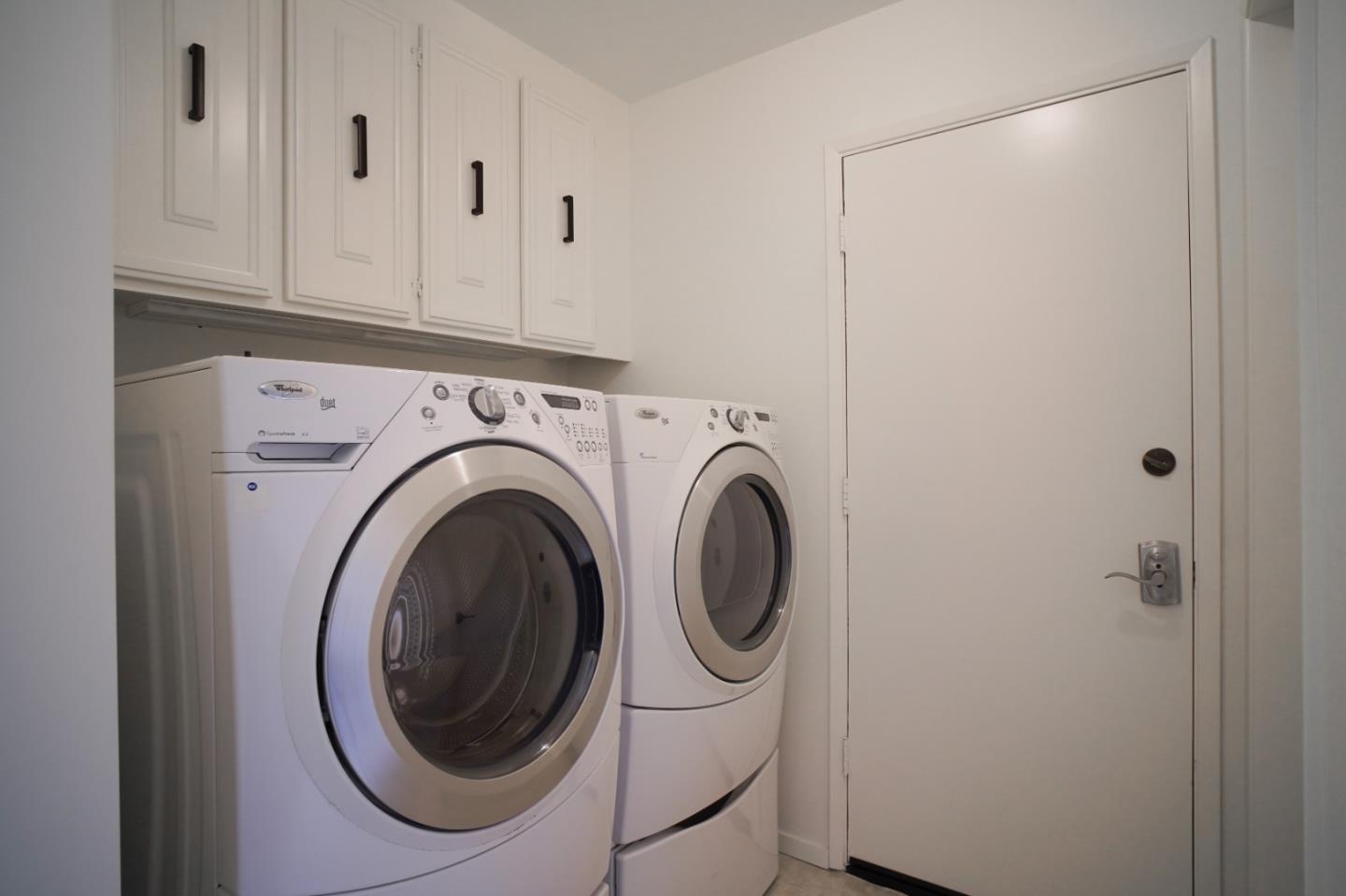 25815 Rio Vista Drive Carmel, CA 93923 - Photo 30 of 49 a utility room with dryer and washer