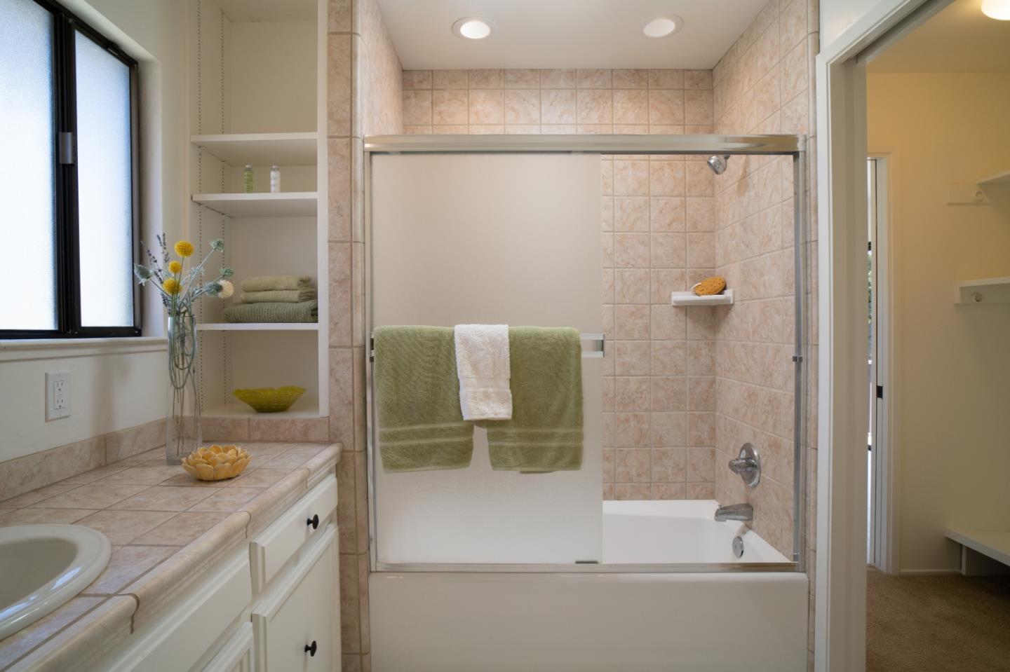 25815 Rio Vista Drive Carmel, CA 93923 - Photo 31 of 49 a bathroom with a shower and a sink