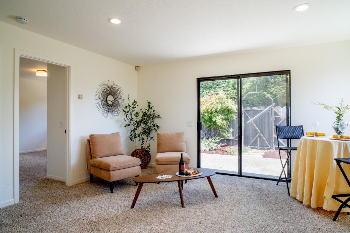25815 Rio Vista Drive Carmel, CA 93923 - Photo 32 of 49 a living room with furniture and a window