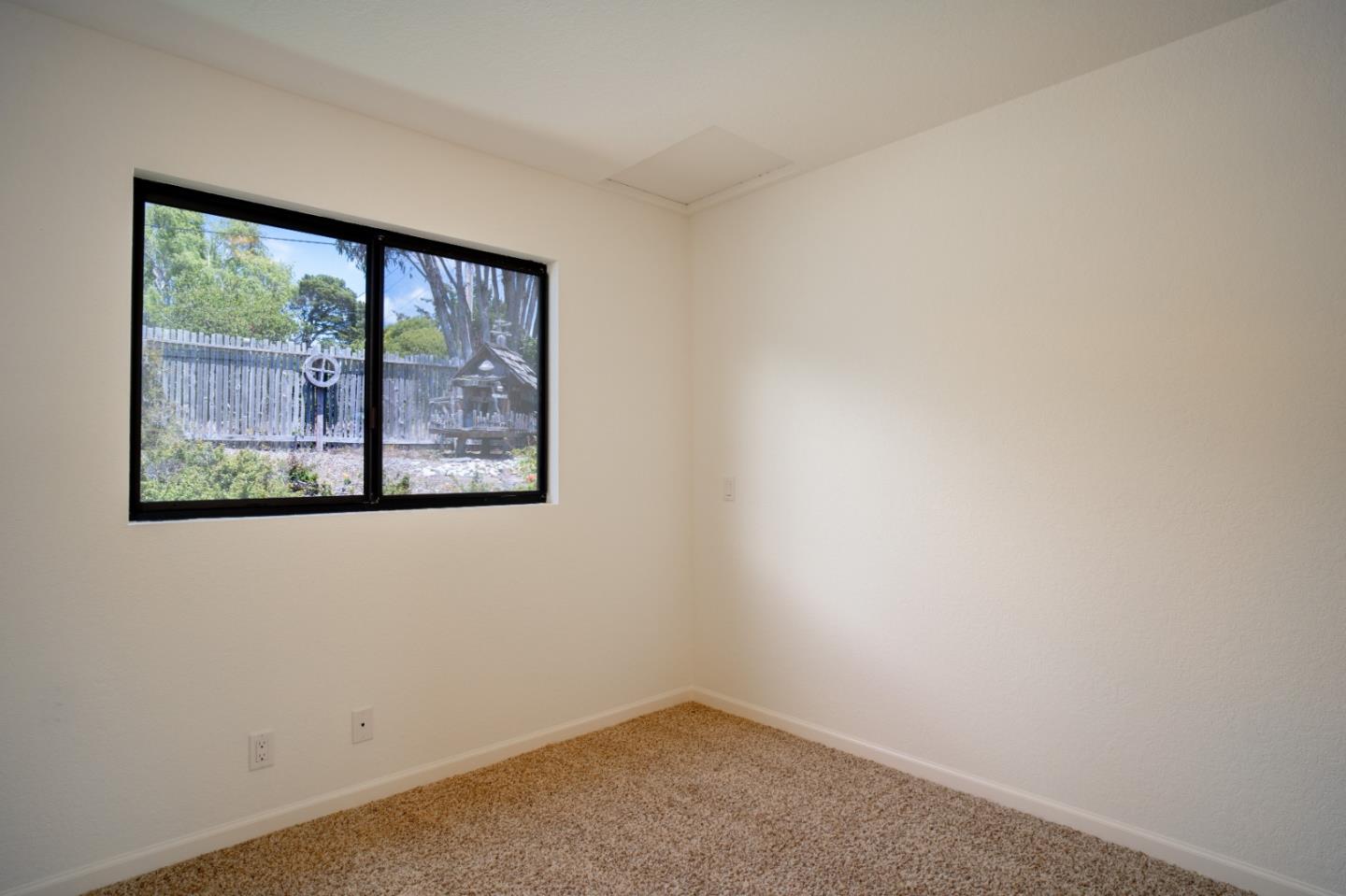 25815 Rio Vista Drive Carmel, CA 93923 - Photo 34 of 49 an empty room with a window
