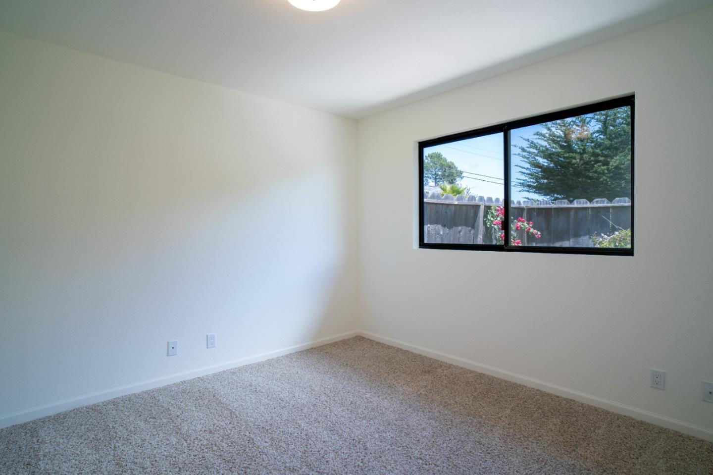 25815 Rio Vista Drive Carmel, CA 93923 - Photo 35 of 49 an empty room with a window