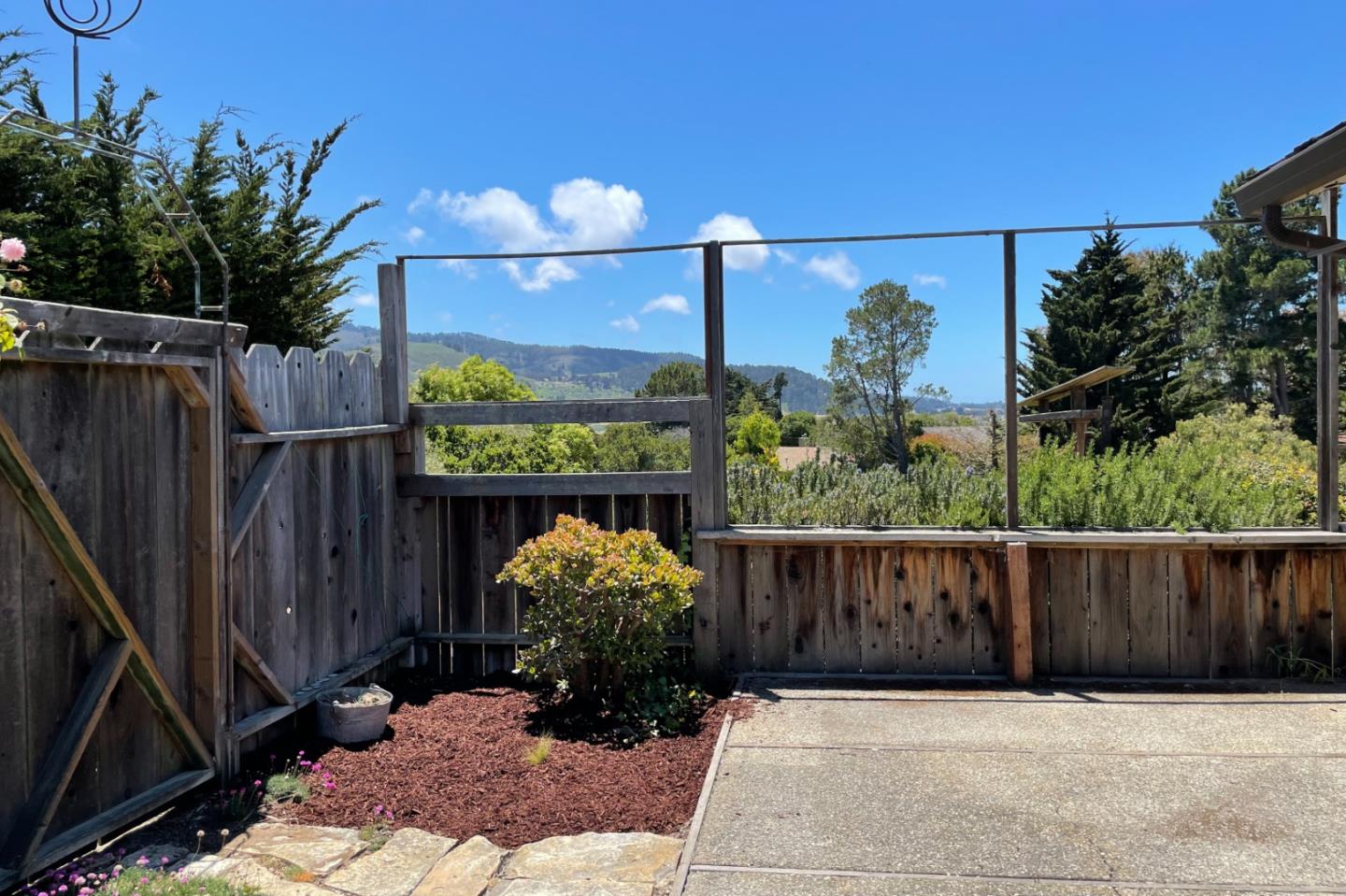 25815 Rio Vista Drive Carmel, CA 93923 - Photo 38 of 49 a view of a dinning table and chairs in patio