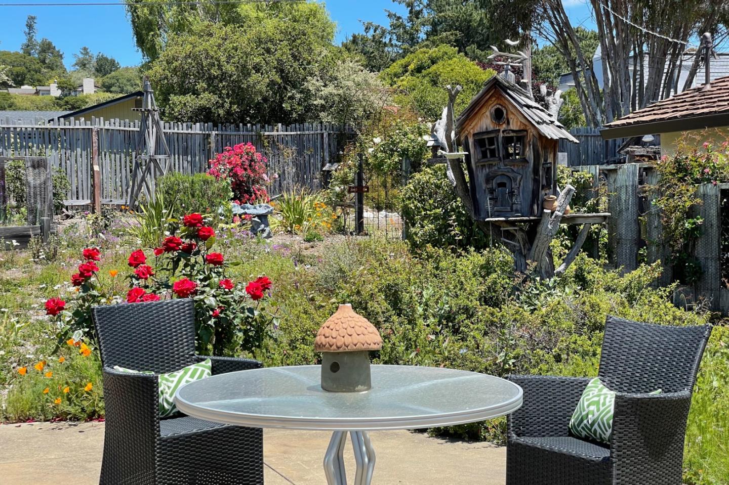 25815 Rio Vista Drive Carmel, CA 93923 - Photo 42 of 49 a view of a chairs and table in a patio