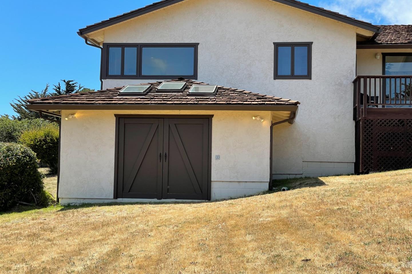 25815 Rio Vista Drive Carmel, CA 93923 - Photo 43 of 49 a view of a house with backyard barbeque and wooden floor