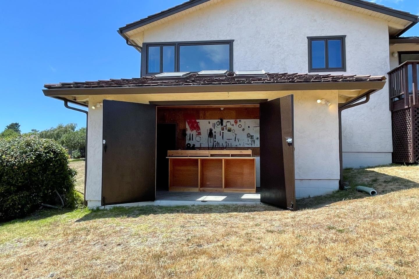 25815 Rio Vista Drive Carmel, CA 93923 - Photo 44 of 49 a view of building with front door and outdoor space