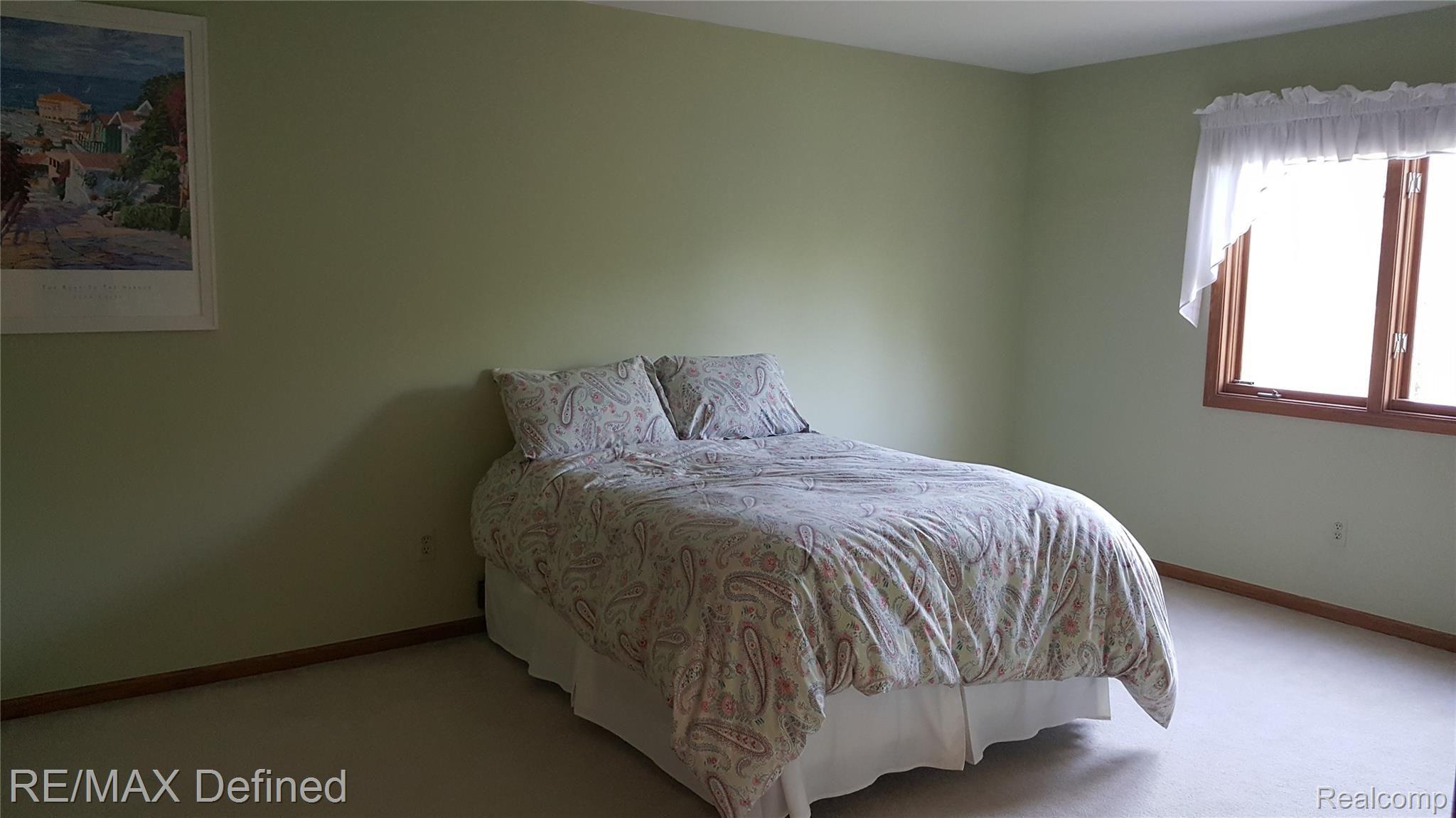 30769 Country Ridge Circle Farmington, MI 48331 - Photo 22 of 31 Bedroom 2 with walk-in closet