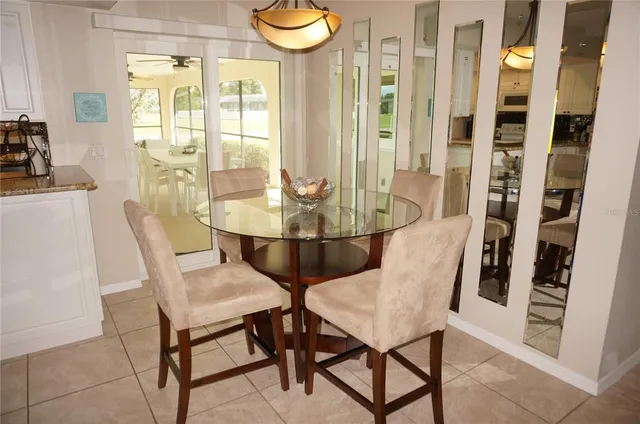a bathroom with a sink toilet and window