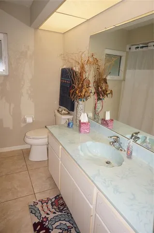 a bathroom with a tub and a sink