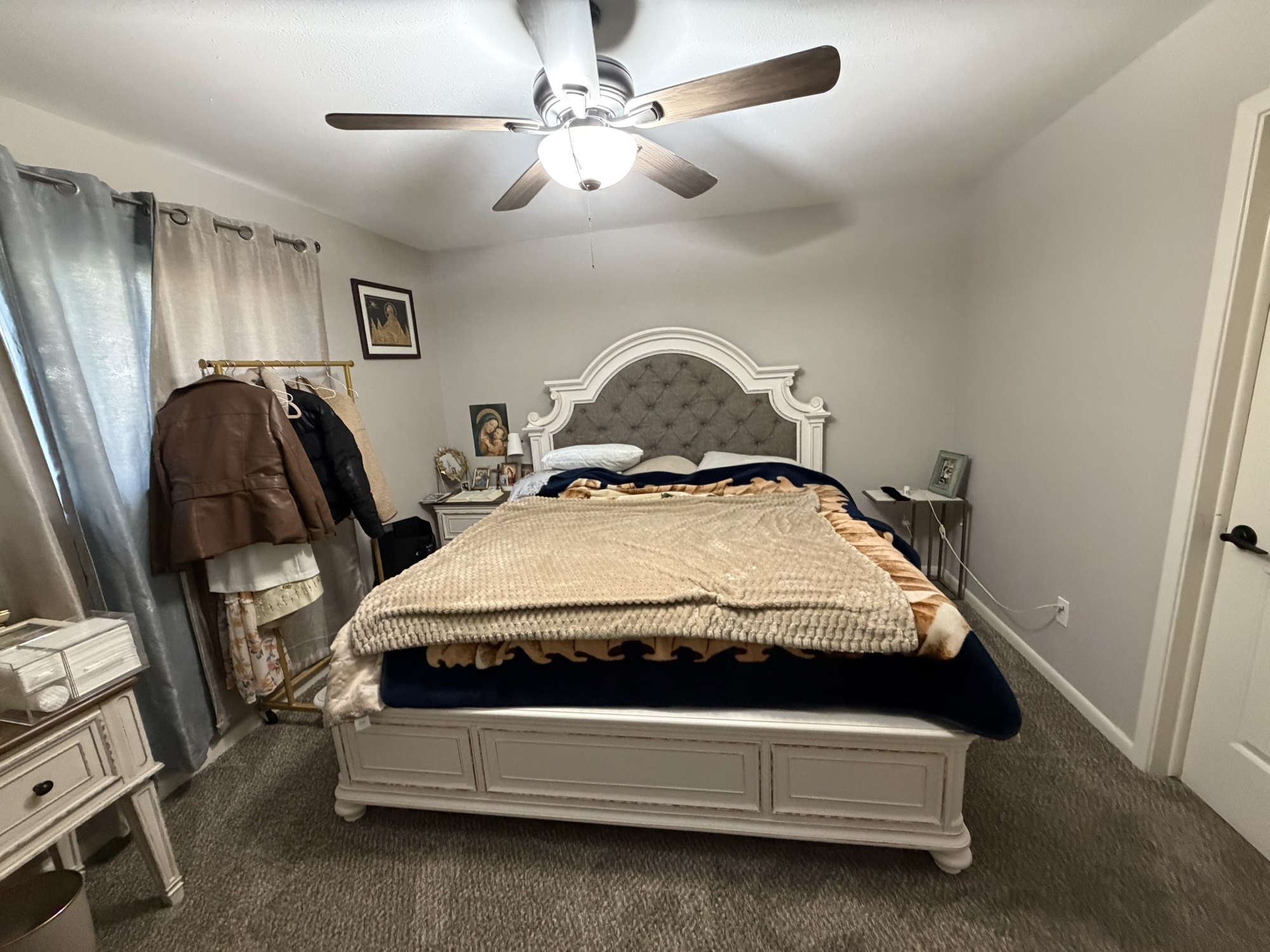 9022 Lazy River Lane Houston, TX 77088 - Photo 20 of 23 a bed sitting in a room next to a window