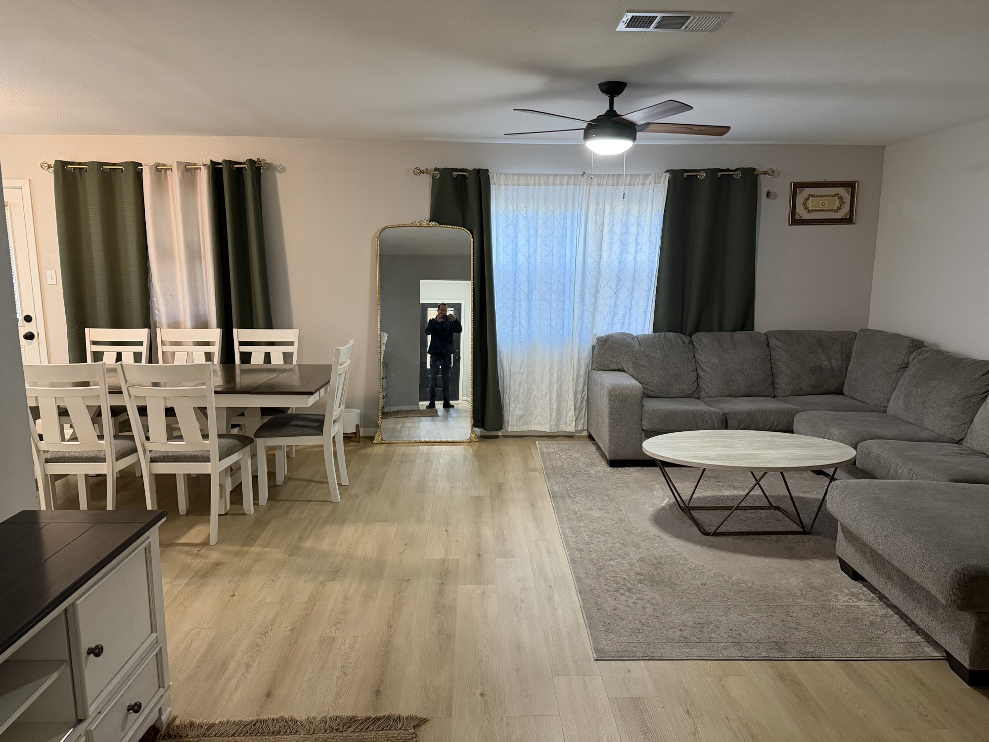 9022 Lazy River Lane Houston, TX 77088 - Photo 4 of 23 a living room with furniture and a dining table