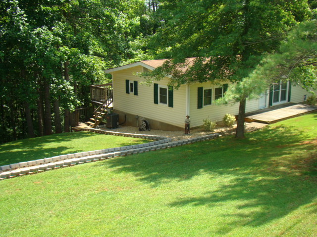 1060 Dickerson Road Goodview, VA 24095 - Photo 3 of 5 a view of house with backyard