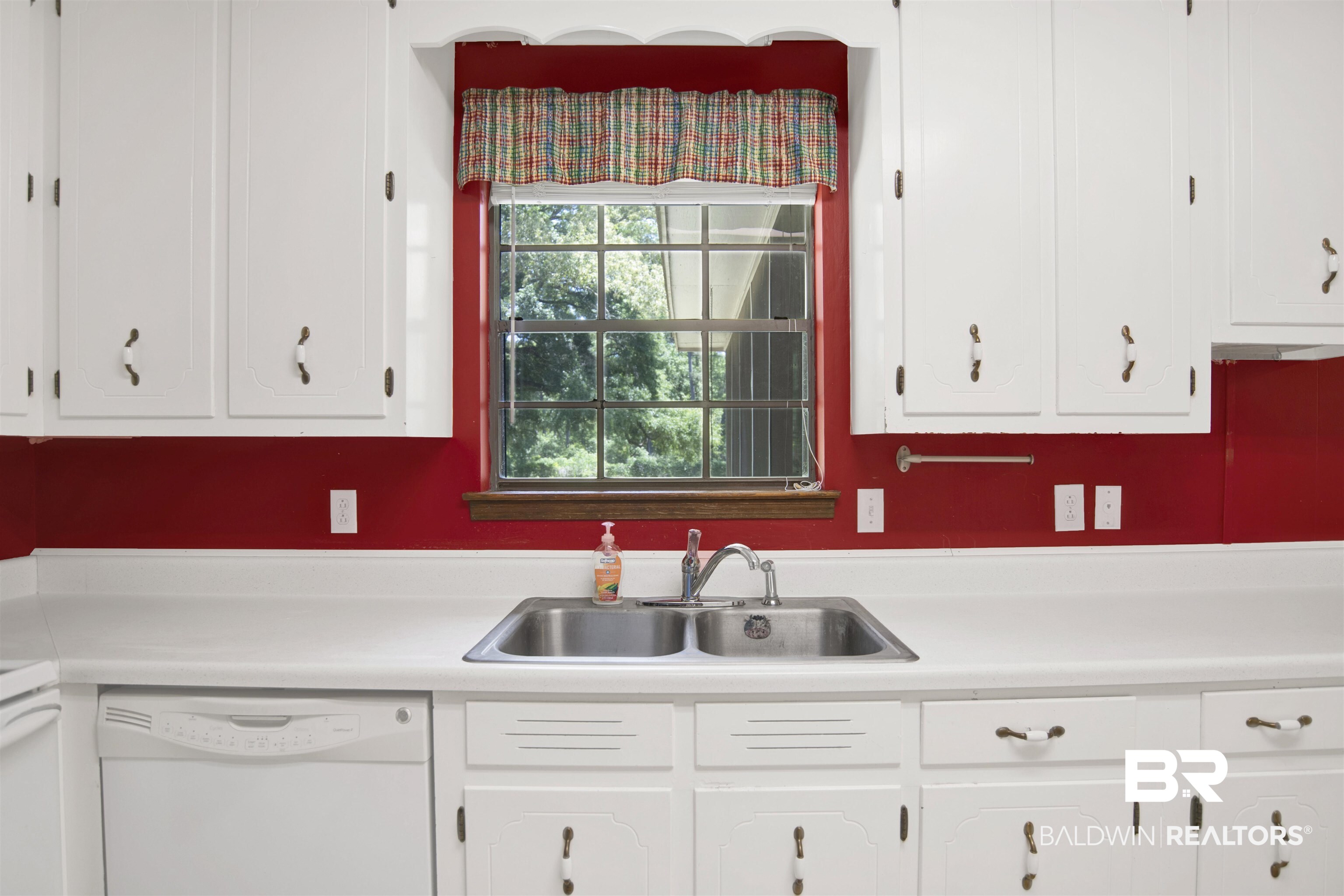 30888 Cemetery Road Daphne, AL 36527 - Photo 6 of 36 Kitchen featuring white cabinetry, white countertops, a double basin stainless steel sink with a chrome faucet, and a built-in dishwasher