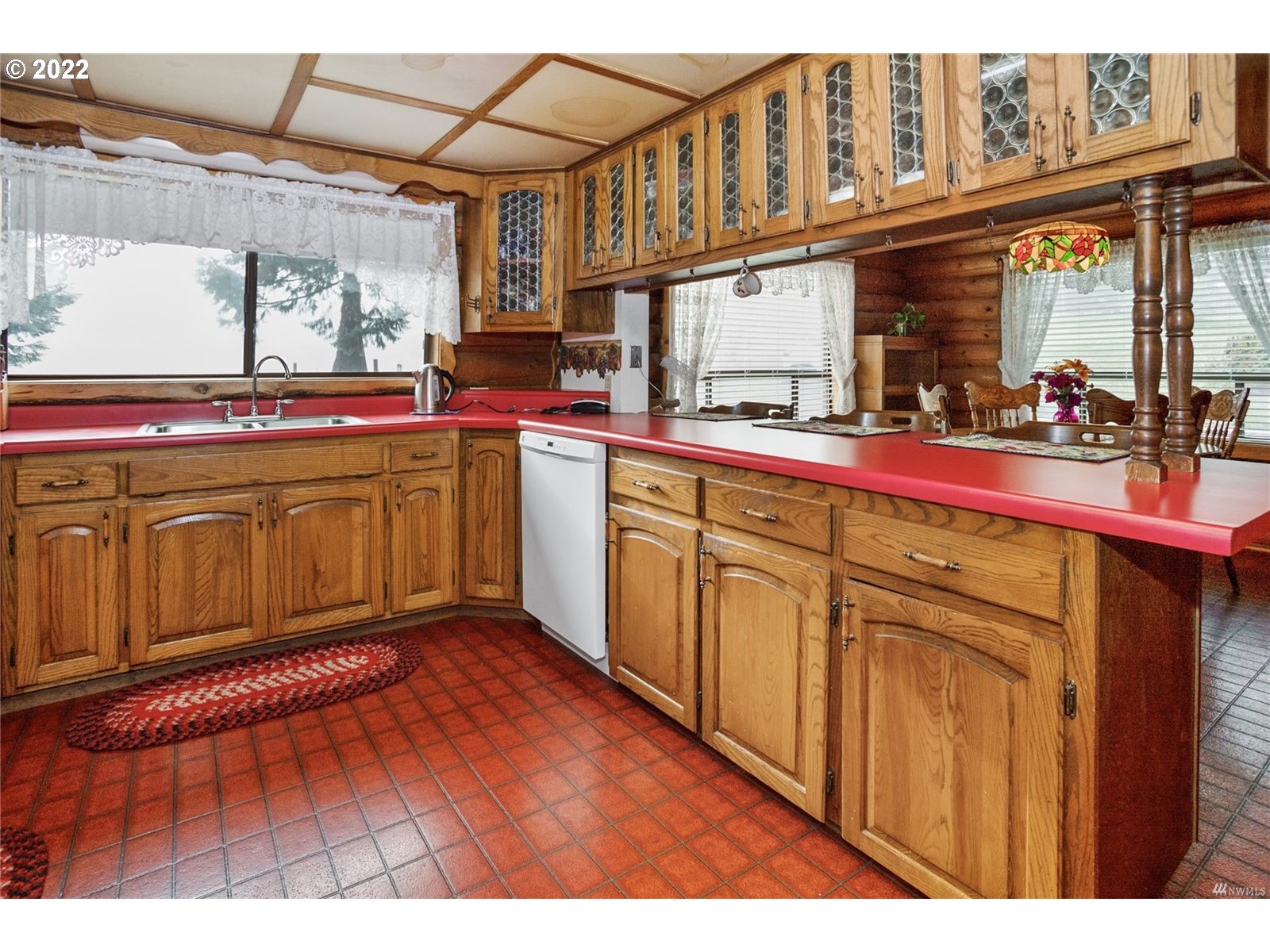 248 Coma Road Winlock, WA 98596 - Photo 11 of 30 a kitchen with stainless steel appliances granite countertop a sink and cabinets