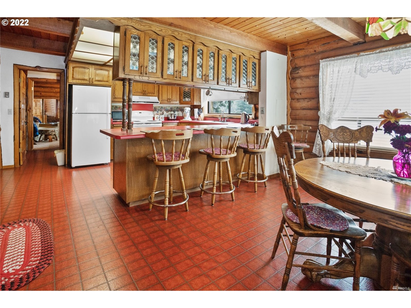 248 Coma Road Winlock, WA 98596 - Photo 8 of 30 a dining room with furniture window and wooden floor