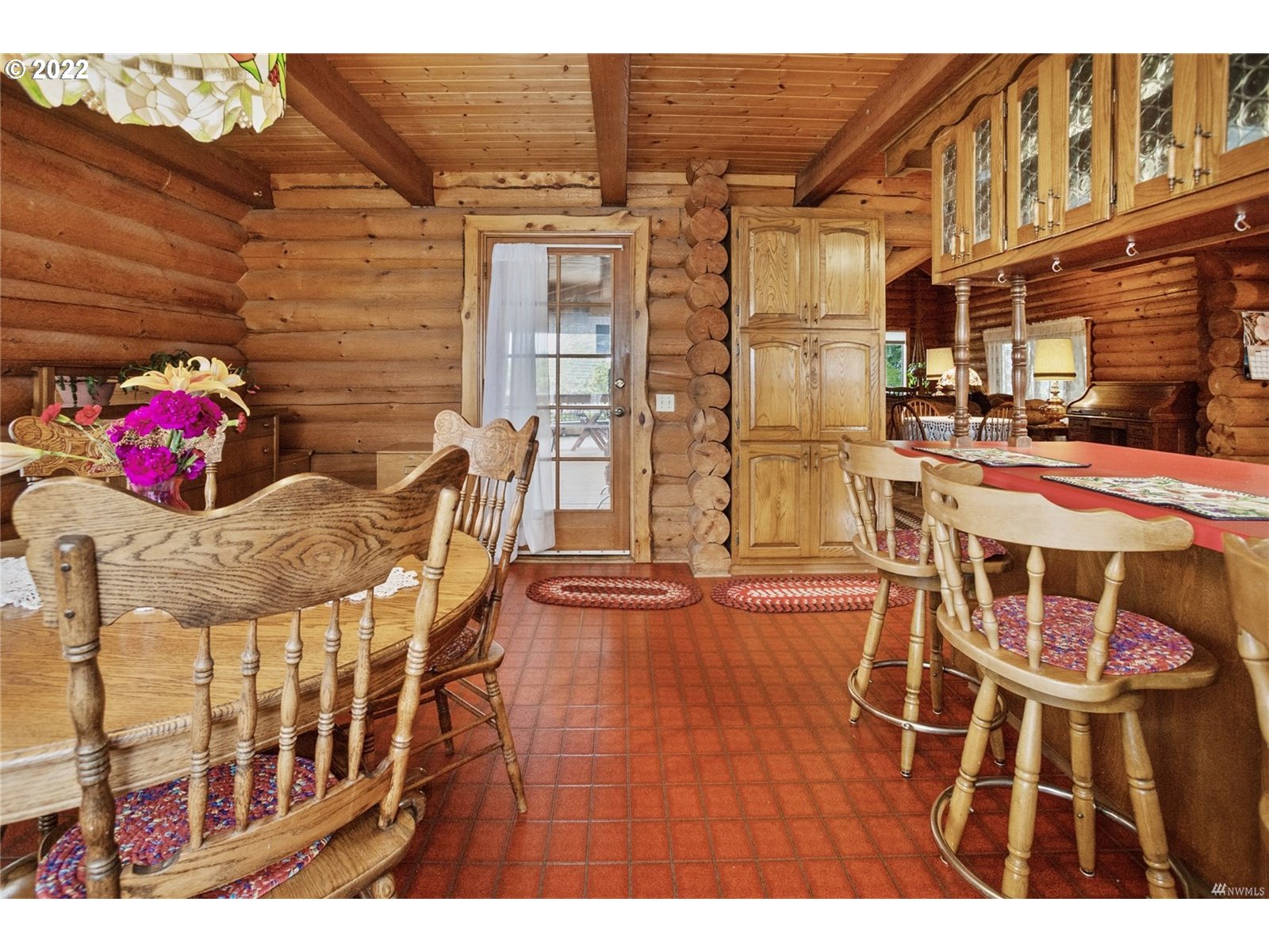 248 Coma Road Winlock, WA 98596 - Photo 9 of 30 a view of a patio with dining table and chairs