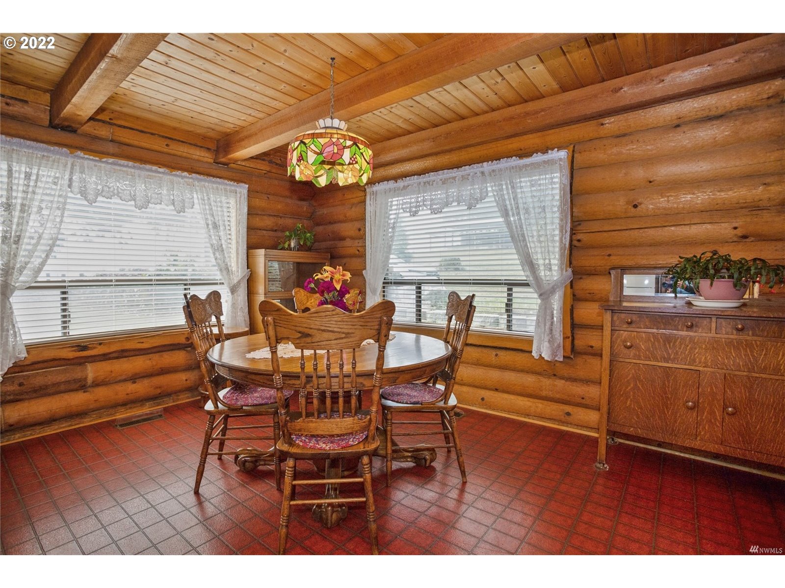 248 Coma Road Winlock, WA 98596 - Photo 10 of 30 a view of a dining room with furniture and wooden floor