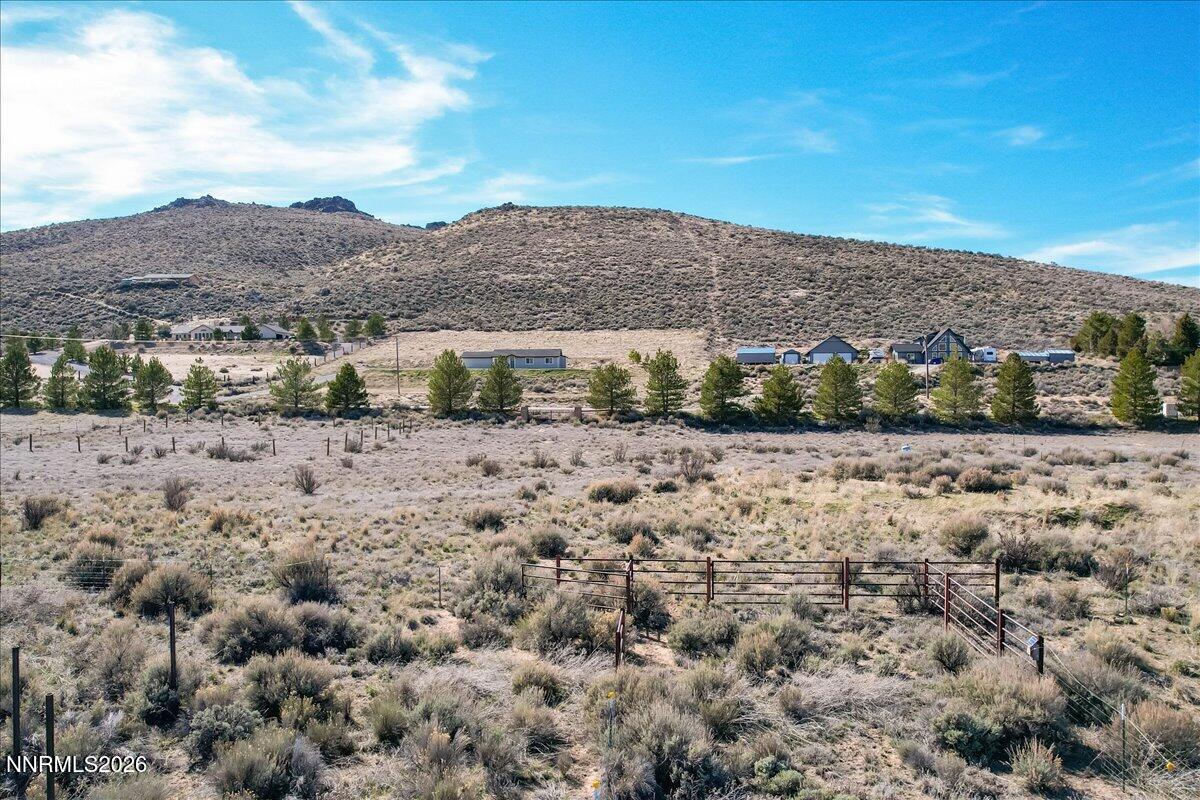 15210 North Red Rock Road Reno, NV 89508 - Photo 17 of 30 a view of a dry field with mountains in the background