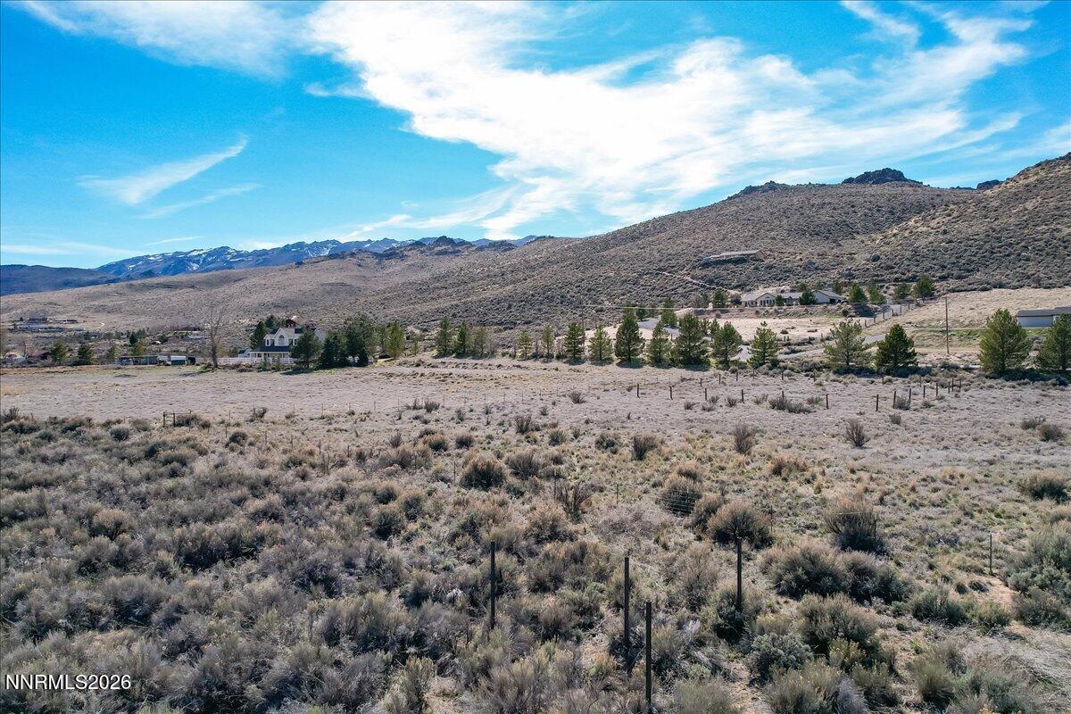 15210 North Red Rock Road Reno, NV 89508 - Photo 18 of 30 a view of a dry field with mountains in the background
