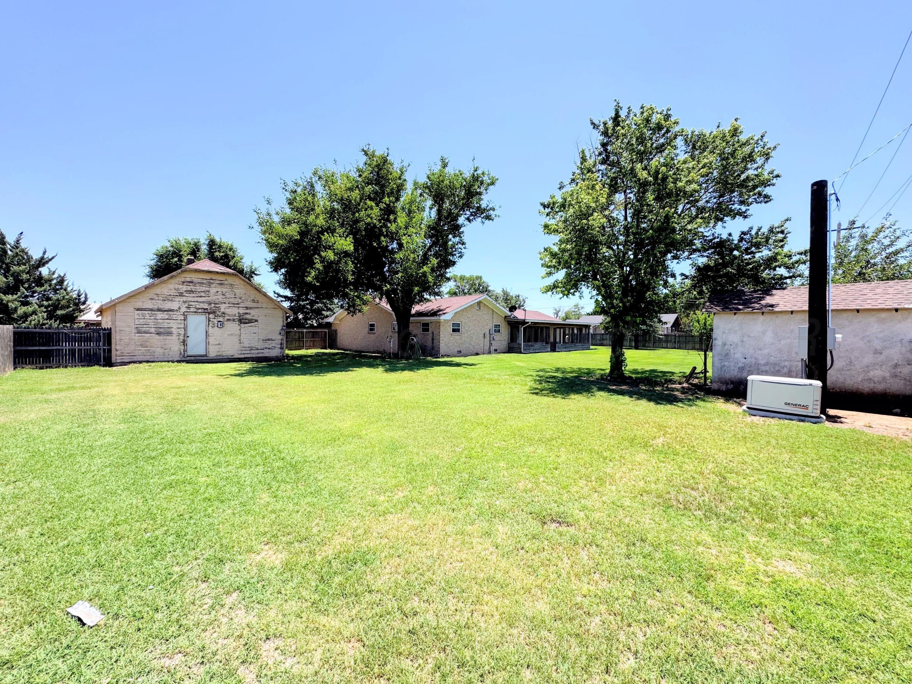 420 South Roland Street Spearman, TX 79081 - Photo 23 of 26 420 S Roland backyard 2