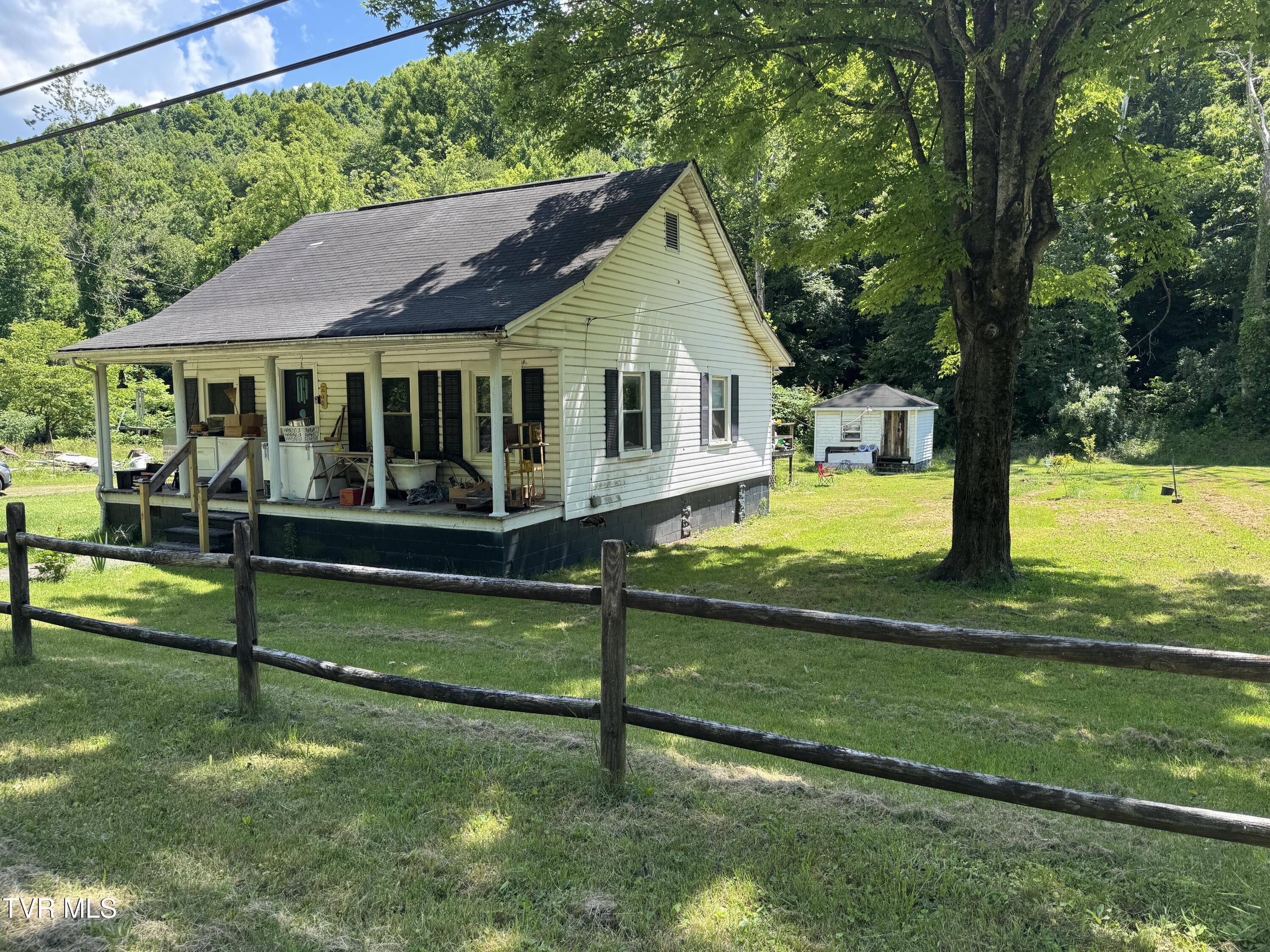 2342 Roda Road Appalachia, VA 24216 - Photo 4 of 6 LEFT FRONT CORNER VIEW WITH LOT