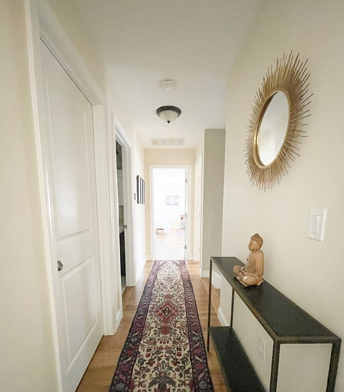 27 Fay Road, Unit 27 Framingham, MA 01702 - Photo 15 of 32 a view of entryway with wooden floor