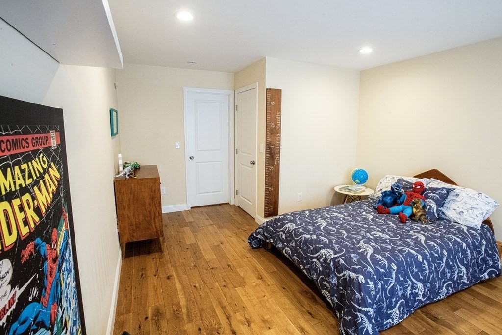 27 Fay Road, Unit 27 Framingham, MA 01702 - Photo 20 of 32 a bedroom with a bed and a tv