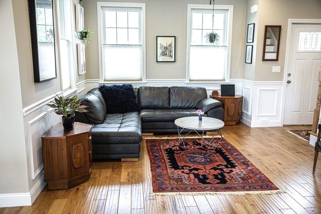 27 Fay Road, Unit 27 Framingham, MA 01702 - Photo 7 of 32 a living room with furniture and a rug