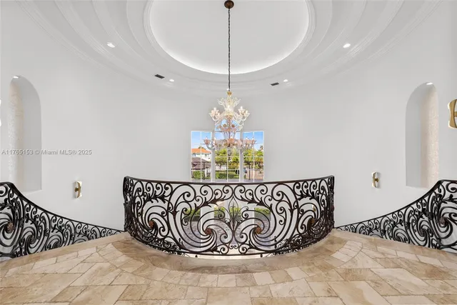 a kitchen with kitchen island granite countertop a sink and cabinets