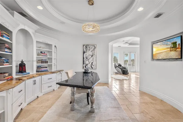 a view of kitchen island with stainless steel appliances granite countertop stove oven and cabinets