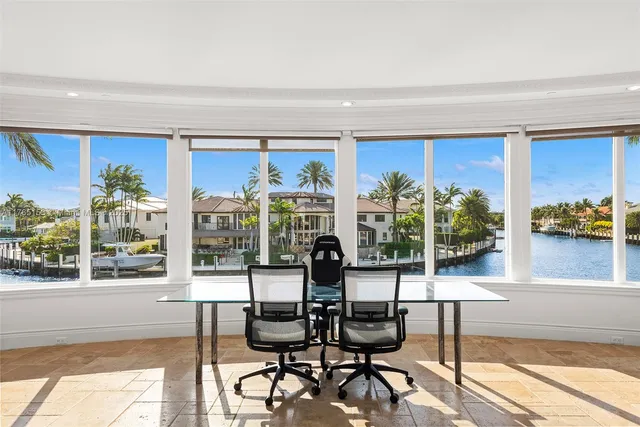 a view of a chandelier and a chandelier in a room
