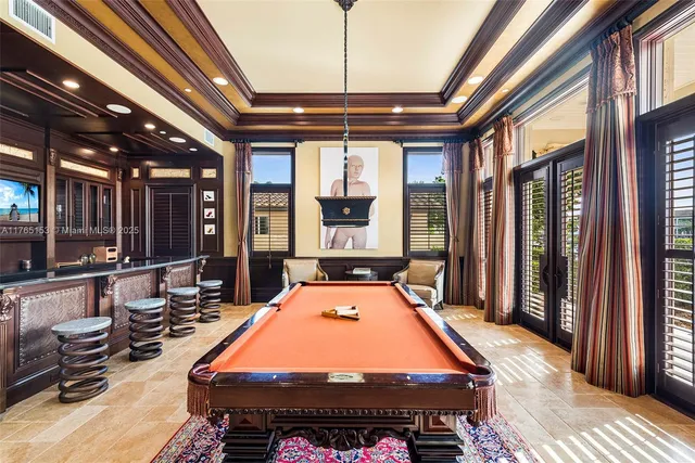 a view of a patio with couches table and chairs and potted plants