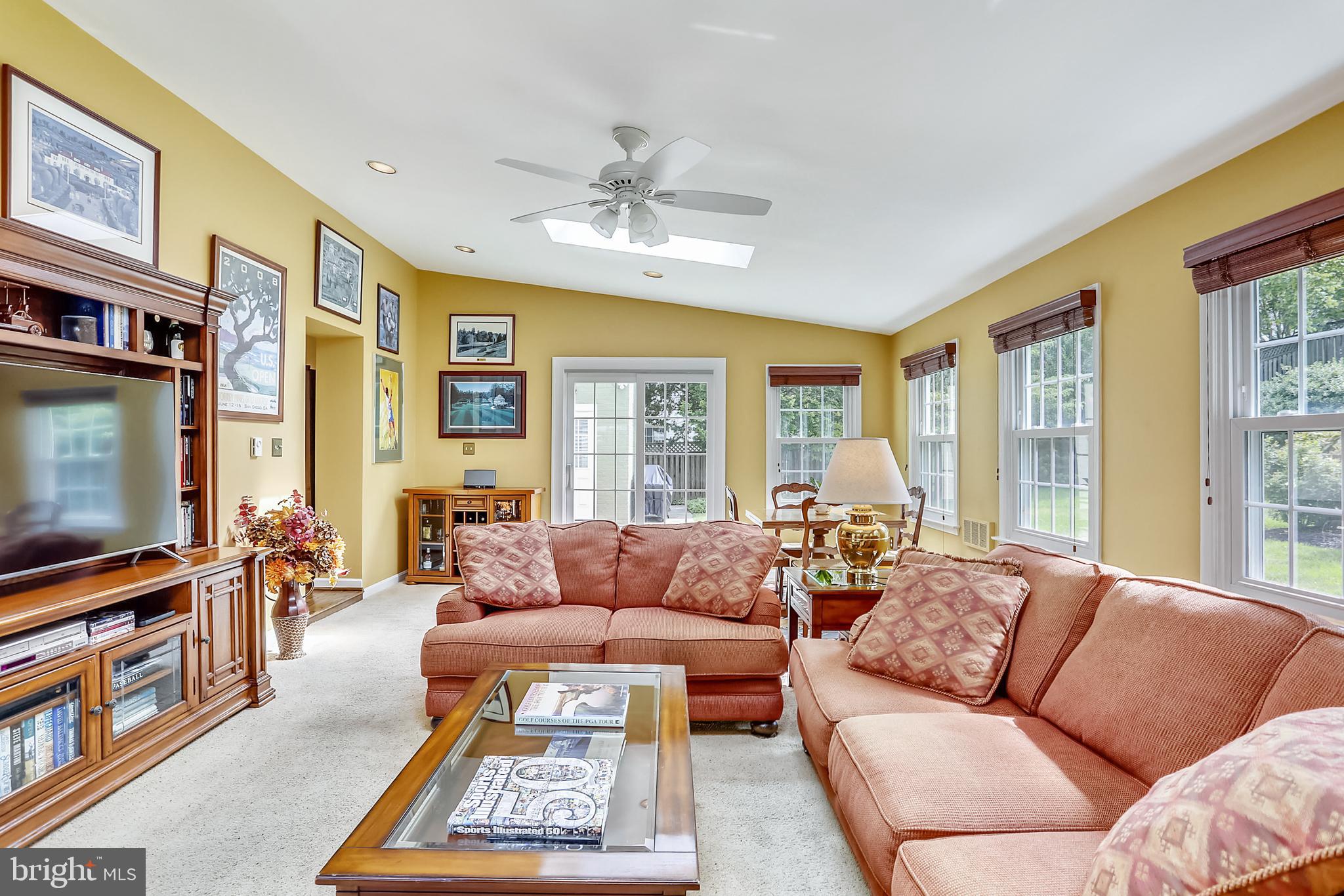 5016 Sangamore Road Bethesda, MD 20816 - Photo 13 of 31 Family room opens to a patio and the backyard